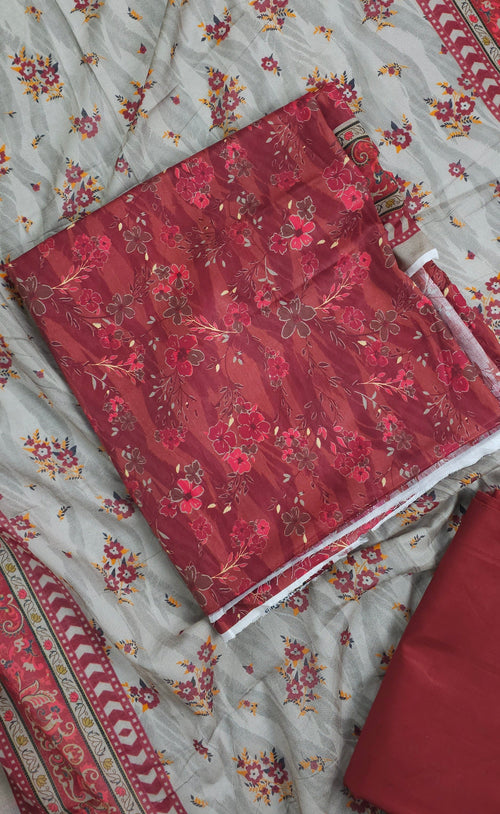 Floral-patterned fabric with a red square on top